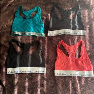 Calvin Klein Teal, 2 Black, and Salmon pink Sports Bras Sold together